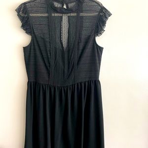 New,  not worn.  Trina Turk - Lace bodice and sleeves. Size 14.